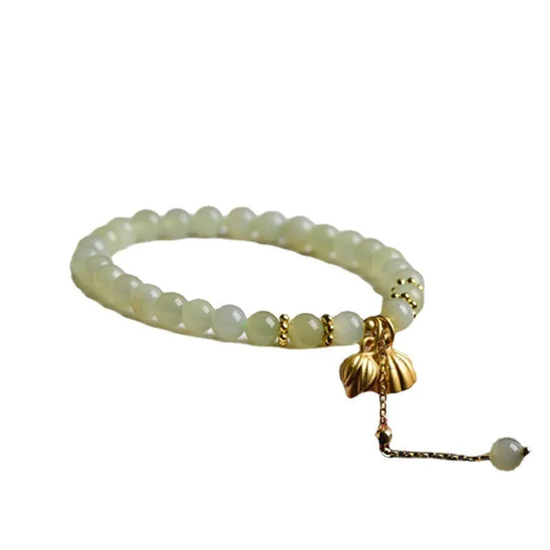 Natural Hetian jade bracelet with lotus carving and fu symbols on 6mm beads