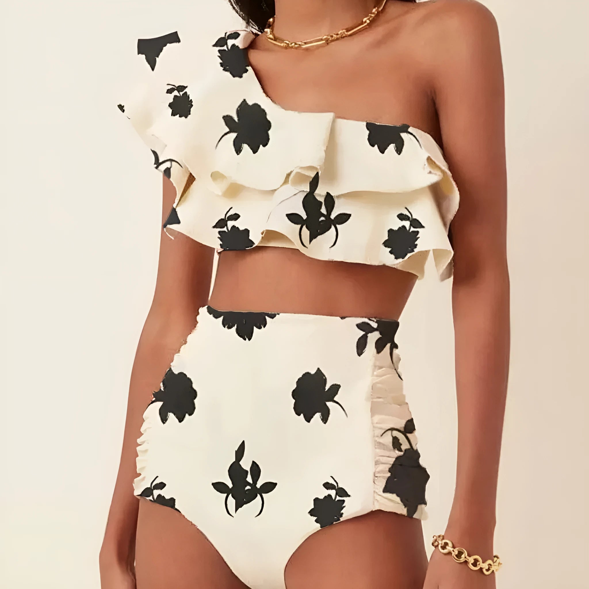 Women's high waist bikini suit with oblique shoulder ruffles and printed patterns in multiple colour options