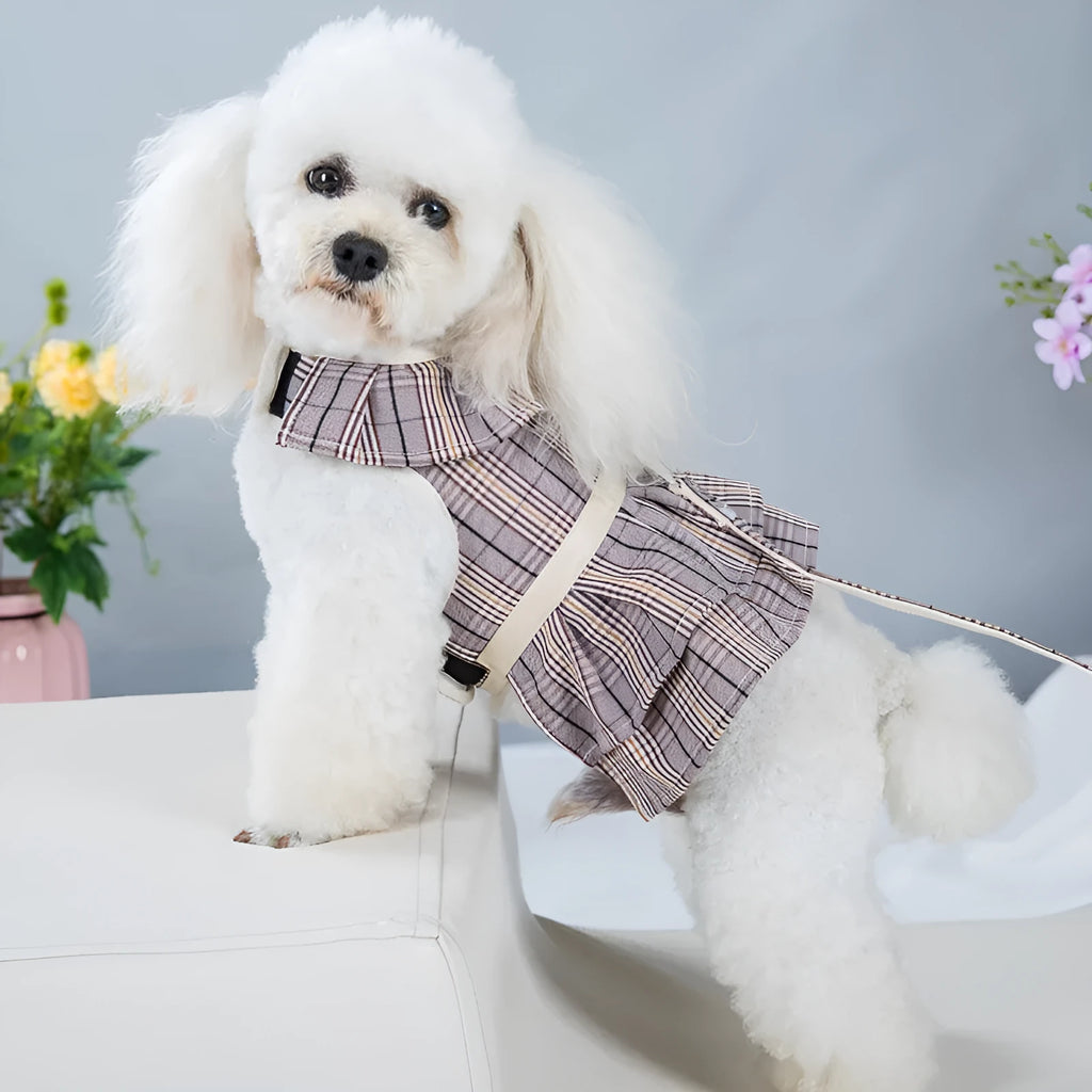 Pet walking vest with chest strap and hand holding rope in polyester fabric, available in milky white or purple colours