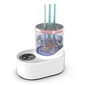 Electric makeup brush cleaner with drying chamber showing brushes inside cleaning device