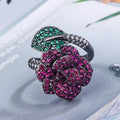 Black gold geometric flower ring with simulated red corundum stone on copper band