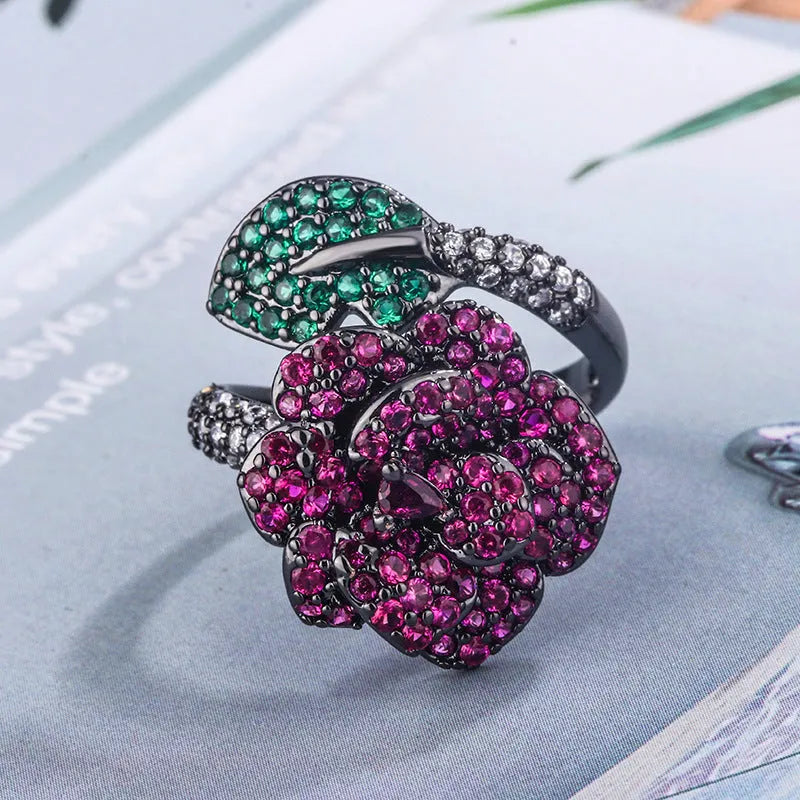 Black gold geometric flower ring with simulated red corundum stone on copper band