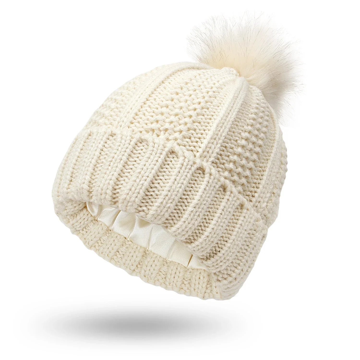 Cozy knit beanies with satin lining, paisley pattern, and faux fur pom poms in a variety of colors