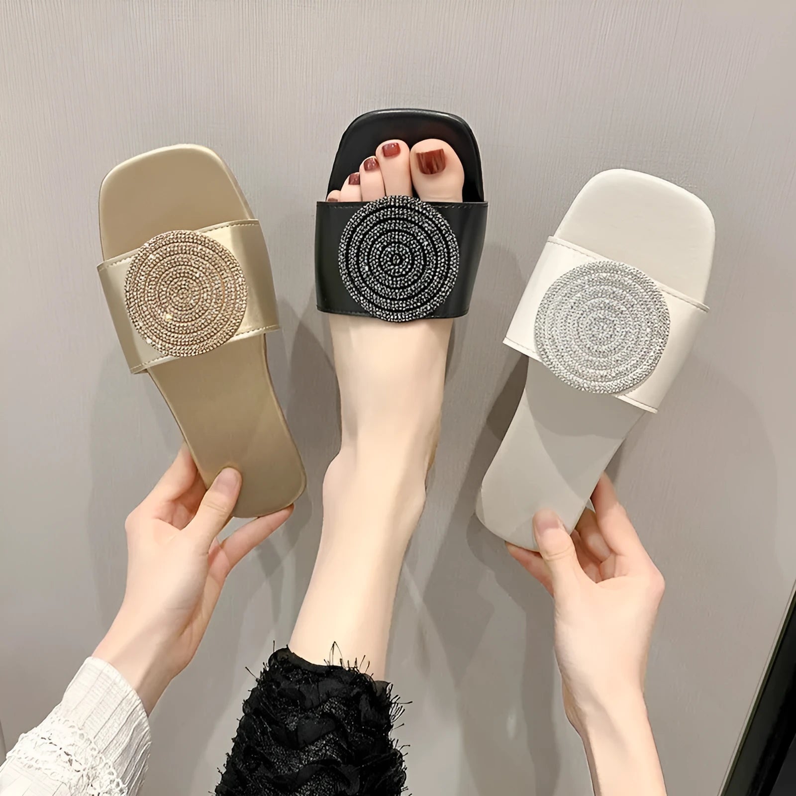 Open toe PU slippers with rhinestone trim in black colour