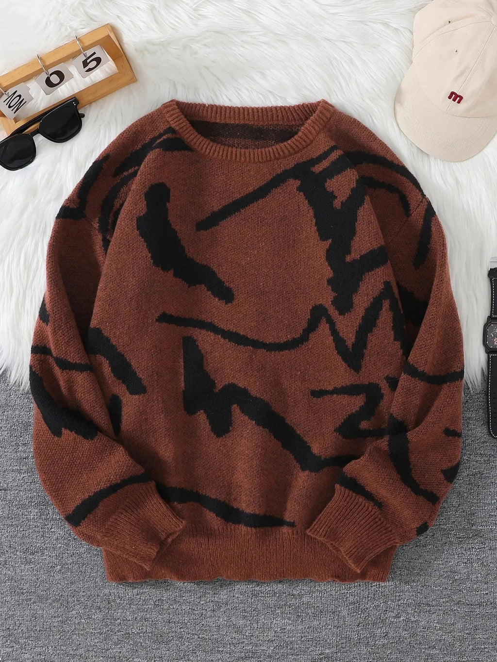 Red graffiti jacquard pullover with long sleeves and loose fit for male teenagers