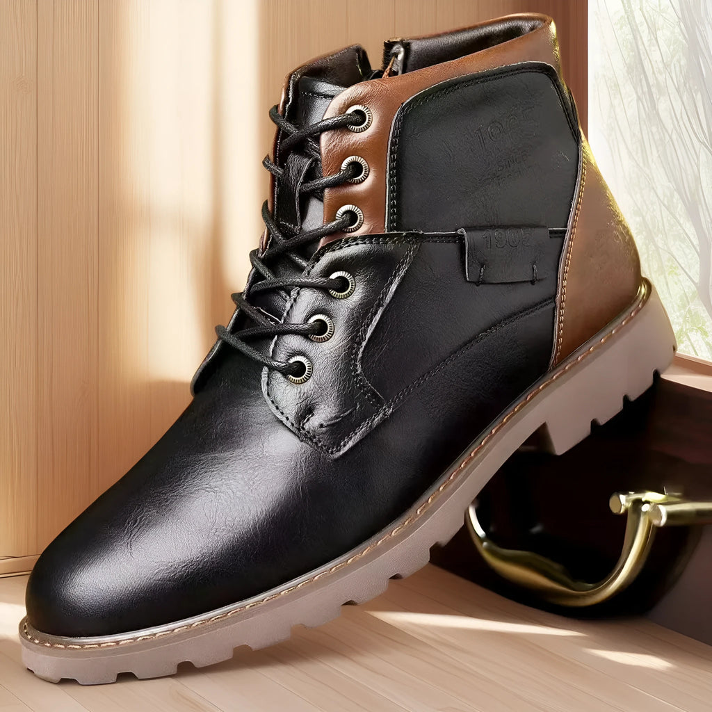 Men's brown ankle boot with a side zip fastening and round toe on a rubber sole.
