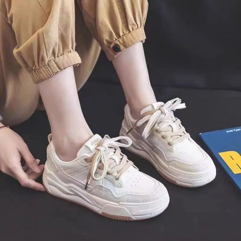 Women's pink spring sneakers with low top design and rubber sole