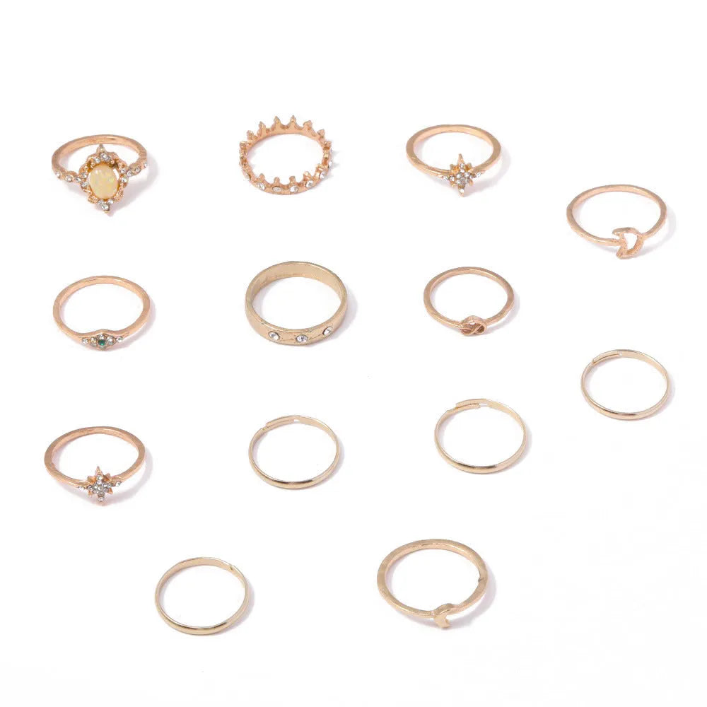 Vintage star and moon 13-piece ring set with opal and rhinestone accents in gold or silver electroplated zinc alloy