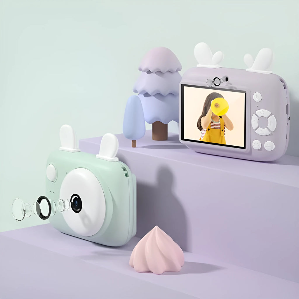 A2 Kids Macaron digital camera in colour options: green, pink, purple, or red.