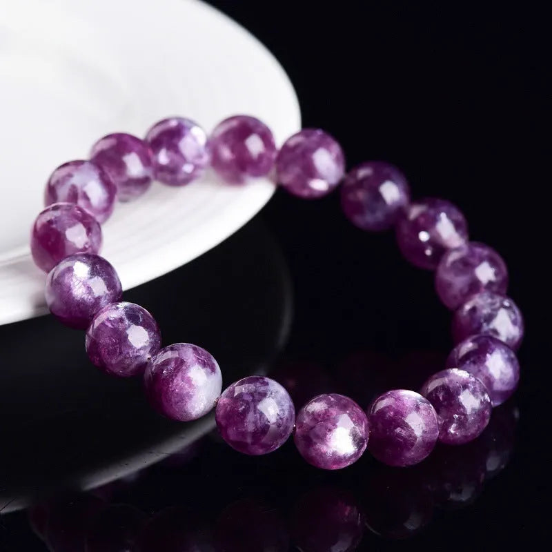 Purple Grandmother Crystal geometric bracelet with polished beads.