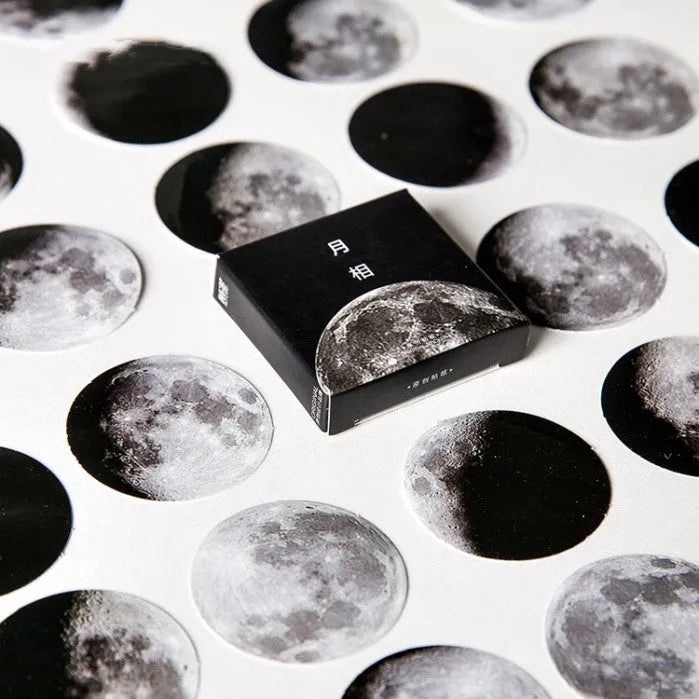 Boxed set of 45 black moon phases and calendar planet stickers for hand accounting