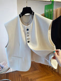 Beige loose-fitting polyester waistcoat dress with a pocket, shown on a hanger