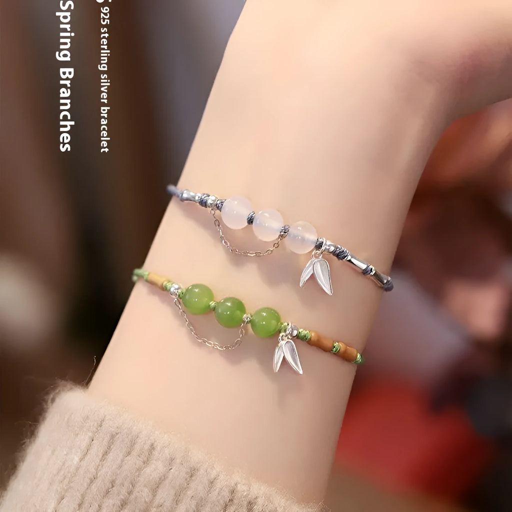 Women's Hetian Jade bracelet with diamond chalcedony and lotus charm on woven strap in light green or haze blue
