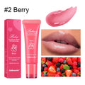 Women's flavoured lip gloss in berry, grape, grapefruit, and yellow peach variants.