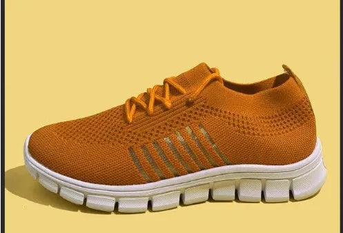 Women's high-cut lace-up platform sneakers in multiple colours on a rubber sole.