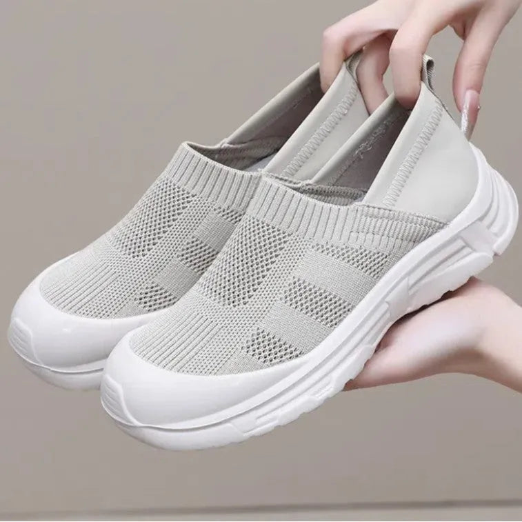 Women's black slip-on shoes with cloth uppers and soft PVC soles