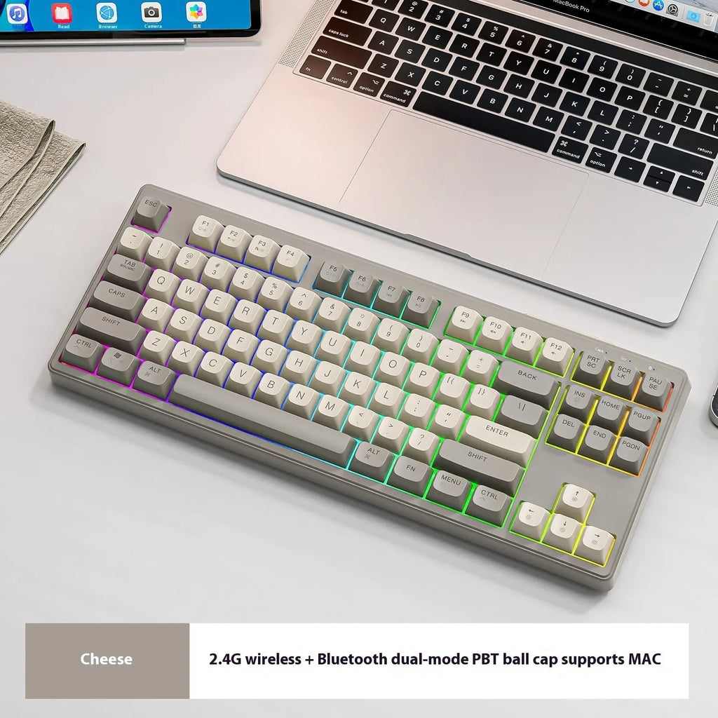 M87 wireless dual-mode mechanical feeling keyboard in blueberry colour on a desk.