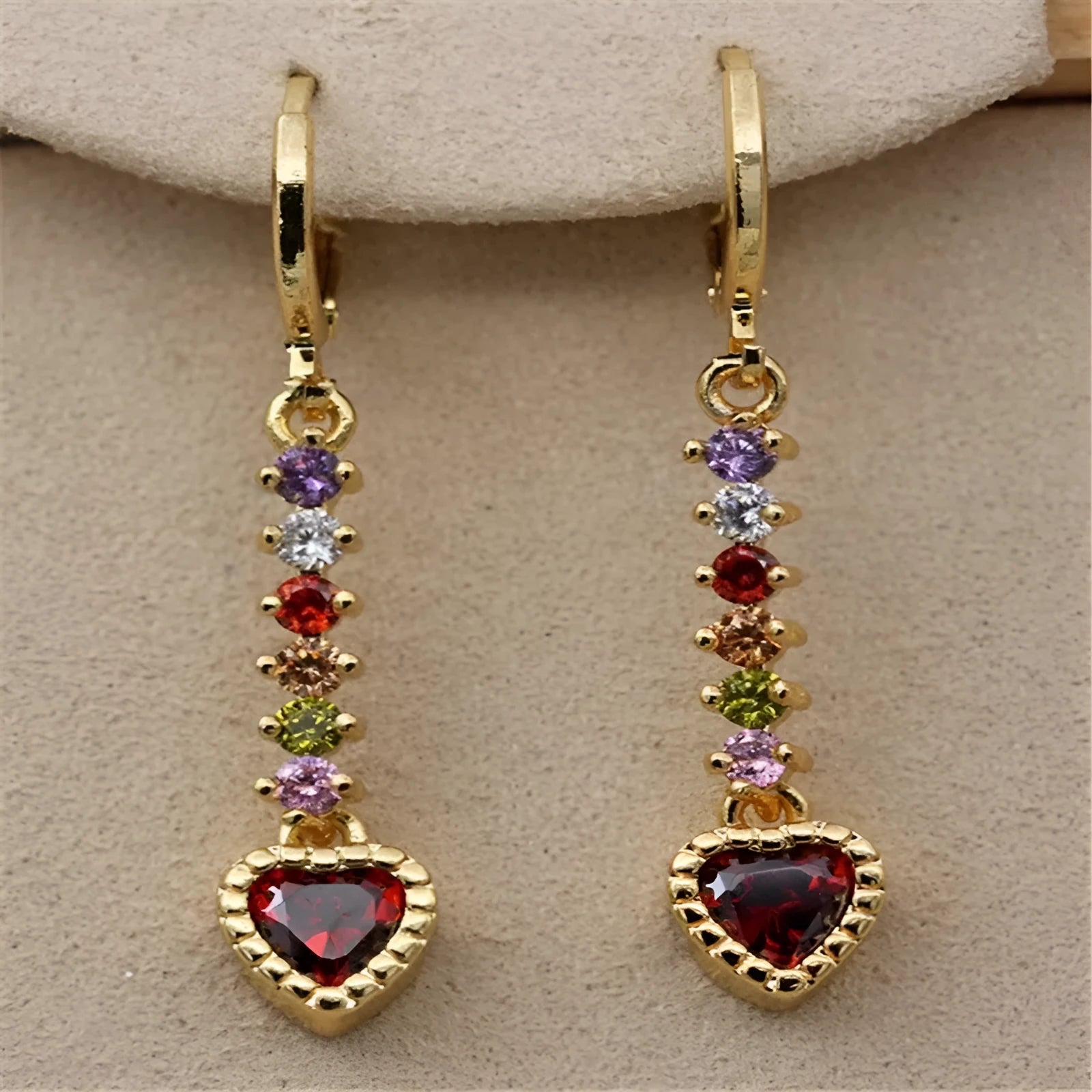 Heart-shaped alloy earrings for women in gold or silver tone with butterfly clasps