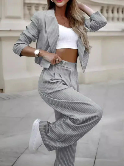 Stylish striped suit set with cropped top and straight-leg pants in various colors