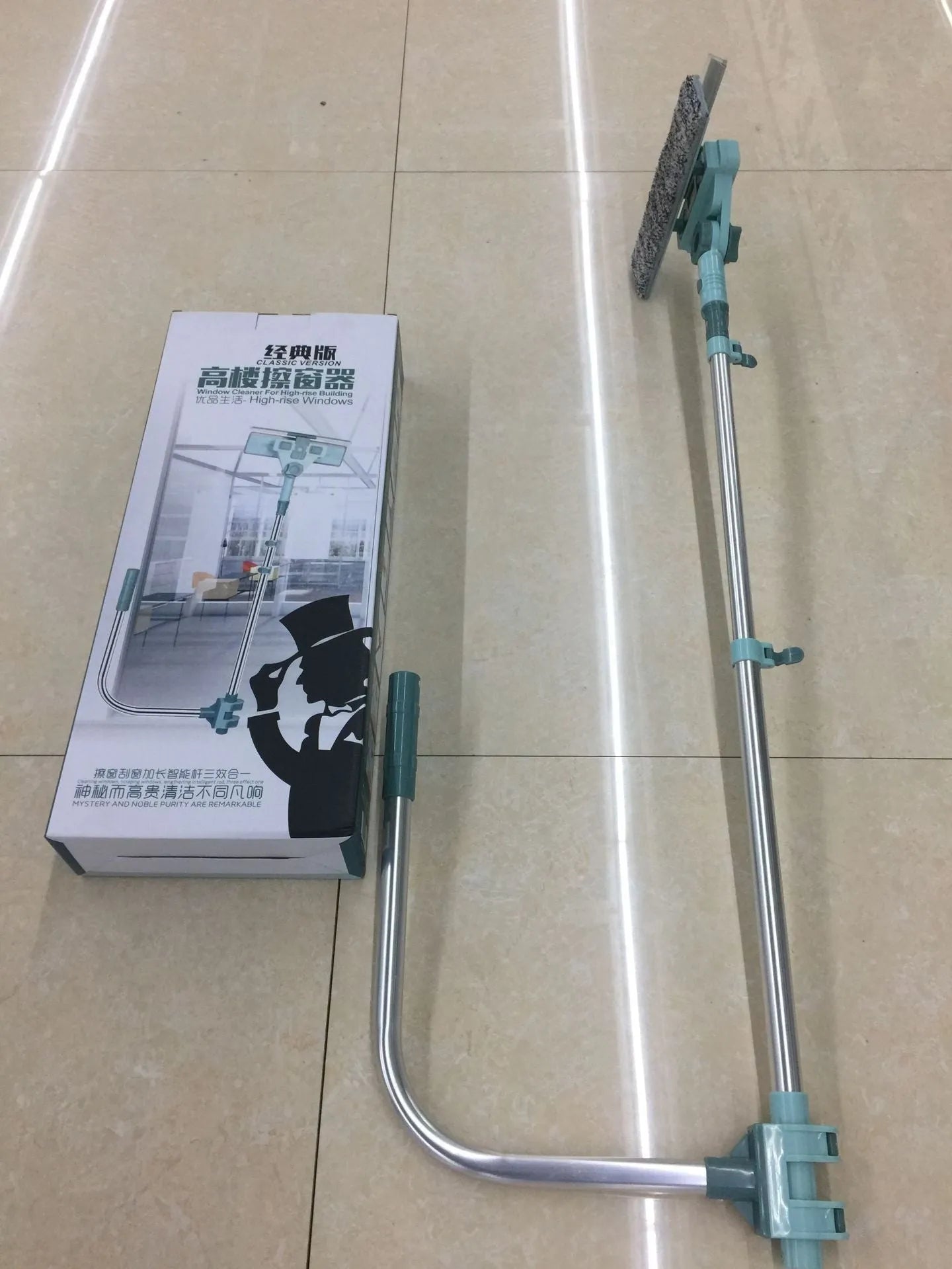 Manual glass cleaner with retractable handle and double-sided stainless steel scraper for high-rise window cleaning