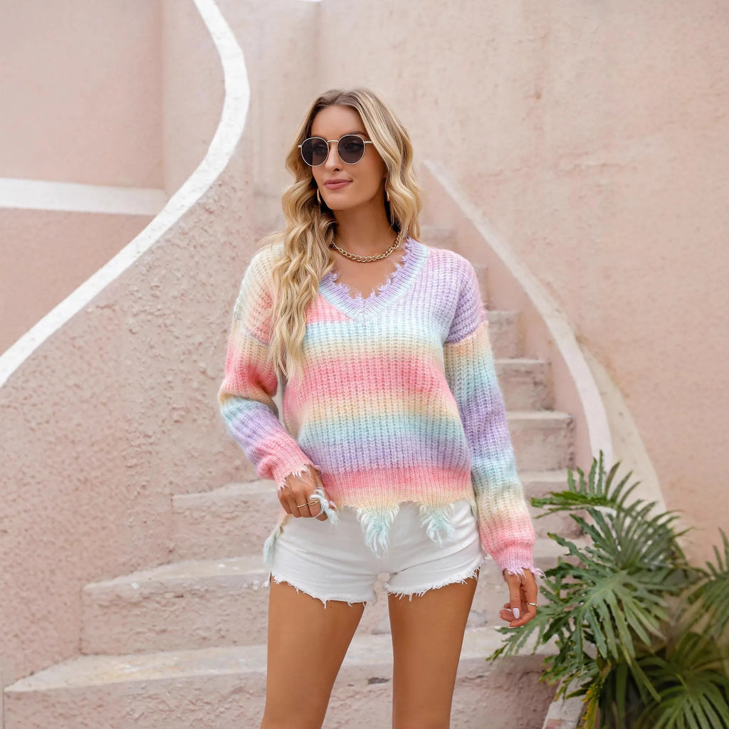 Pink rainbow gradient knitted pullover sweater with loose fit and tassel detailing in plus sizes