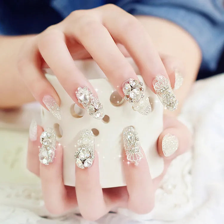 Finished fake nails set of 24 with silver water drops pattern in wearing armour style
