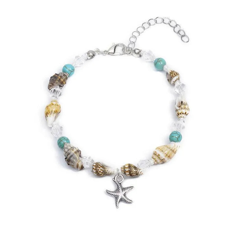 Alloy shell crystal beads bracelet with starfish pendant and conch beads on white background