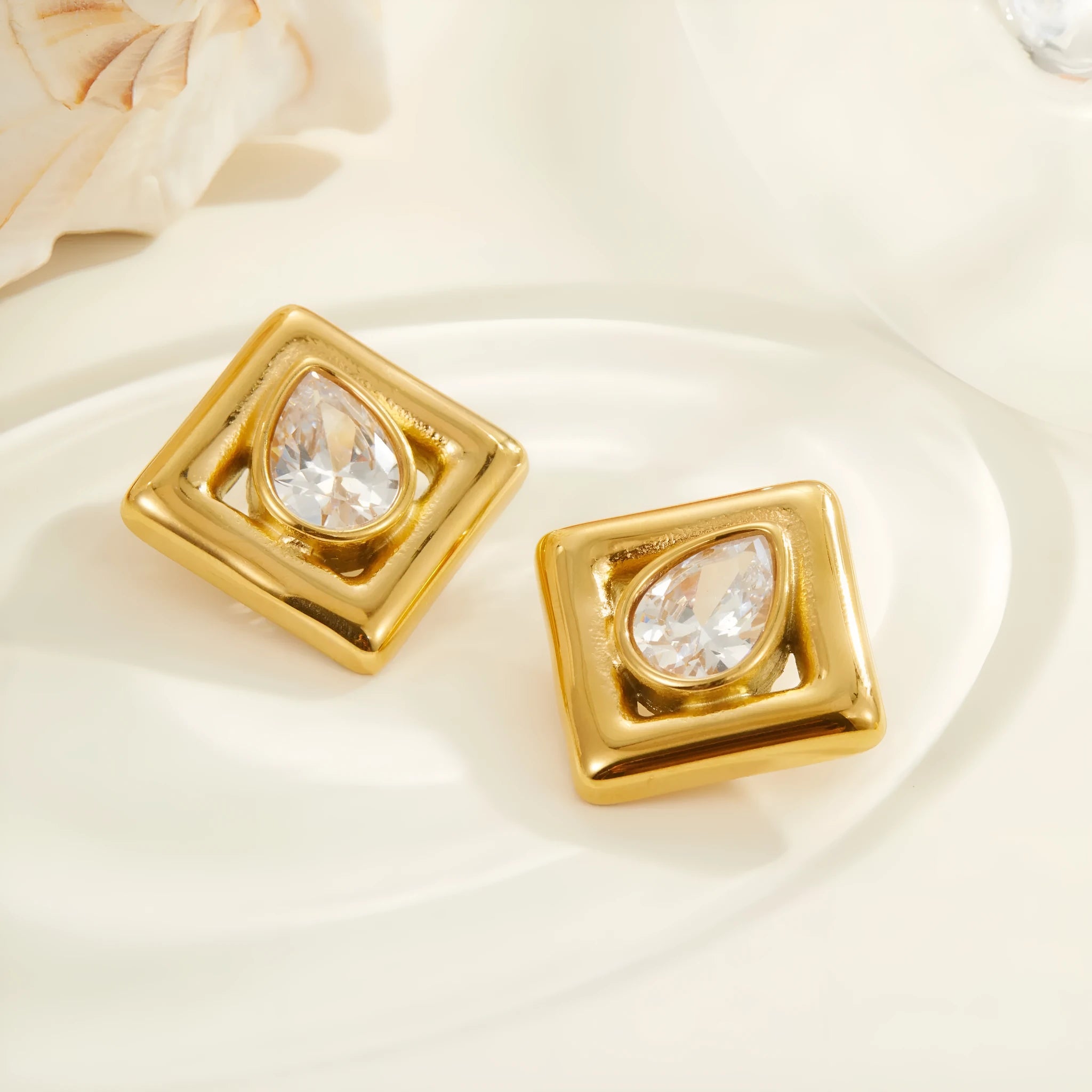 Geometric gold electroplated stud earrings with inlaid water drop zircon stones