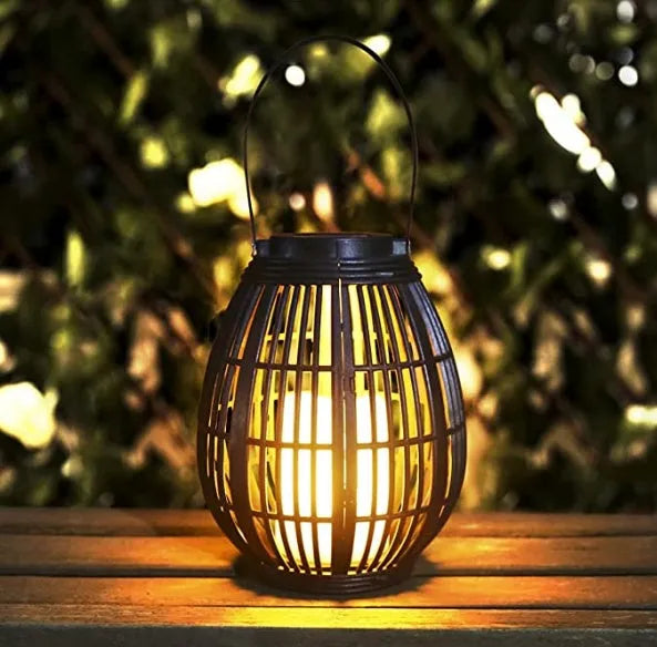 Solar retro patio rattan garden light with oval design and LED illumination