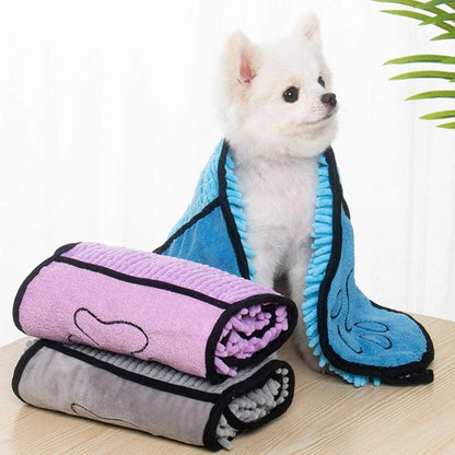 Ultra-absorbent microfiber pet towels in various colors, including blue, purple, grey, and rose red, with a unique double-pocket design for convenient drying and cleaning of dogs and cats