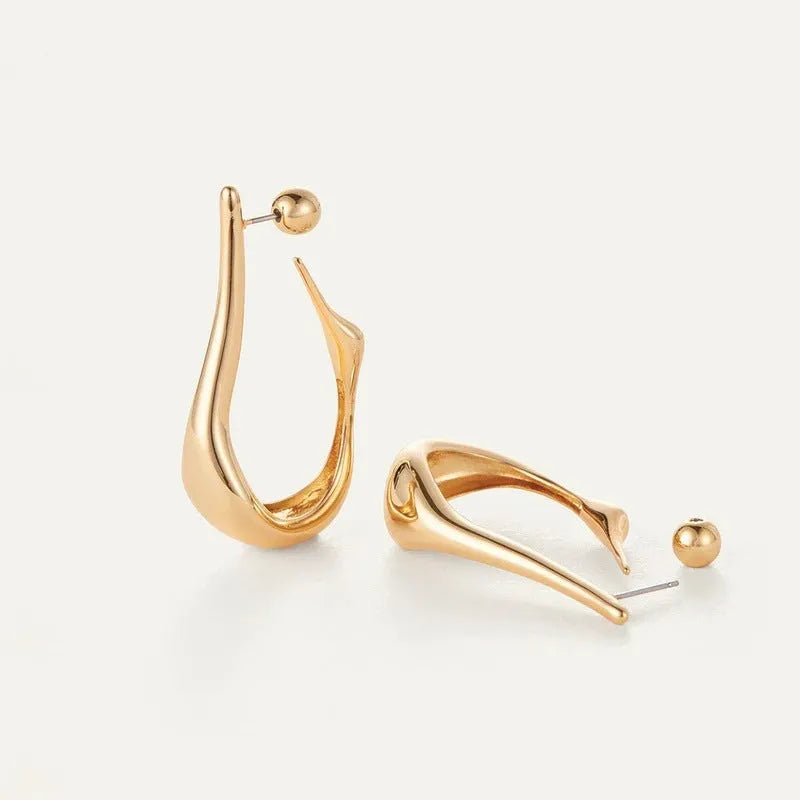 Copper plating 18K real gold irregular lines geometric needle ear studs on white background