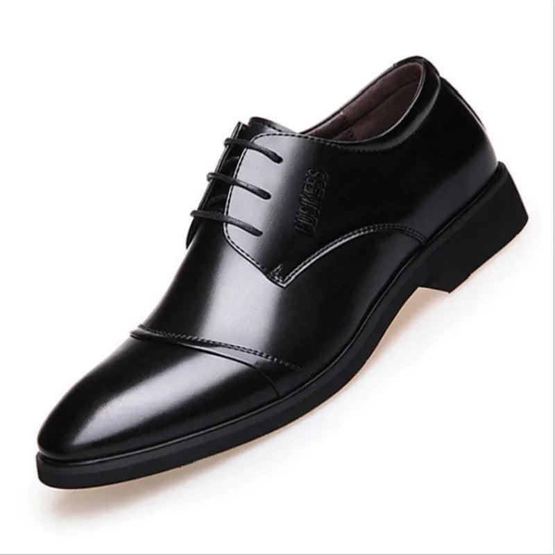 Men's black leather lace-up ankle boot with stitching detail and rubber sole