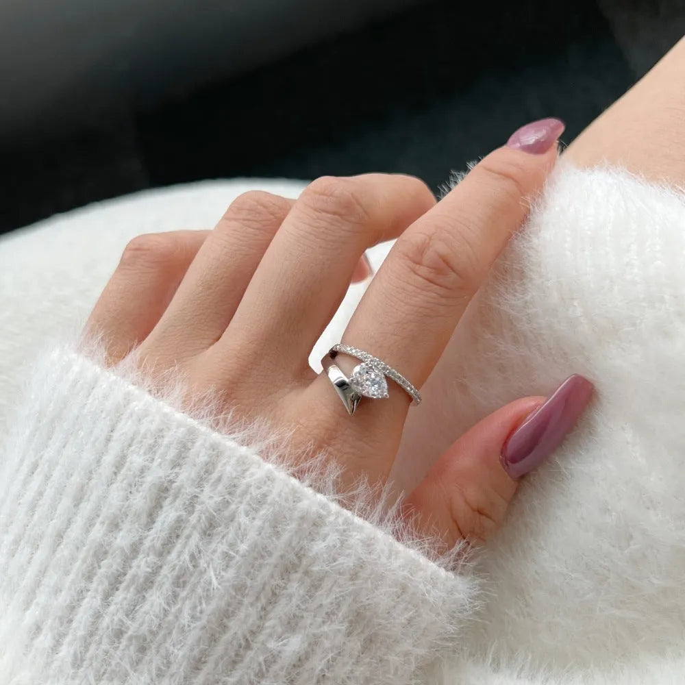 Women's silver water drop diamond ring with electroplated finish, geometric drop shape, golden pink diamond colour option