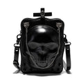 Black mini square crossbody bag with embossed skull design and metal chain strap