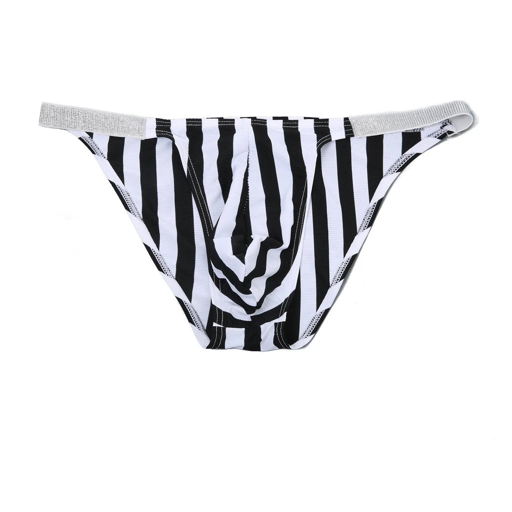 Men's shiny nylon briefs with black and white zebra stripe pattern showing low waist design