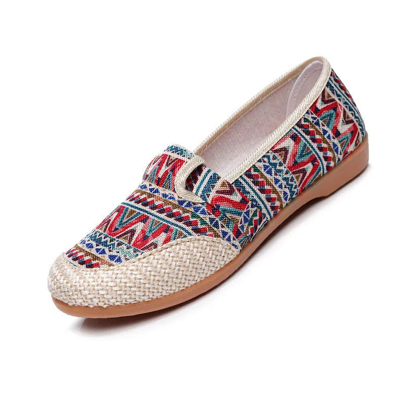 Women's ethnic style cloth shoes with flat heel, colour stitching, and shallow mouth opening
