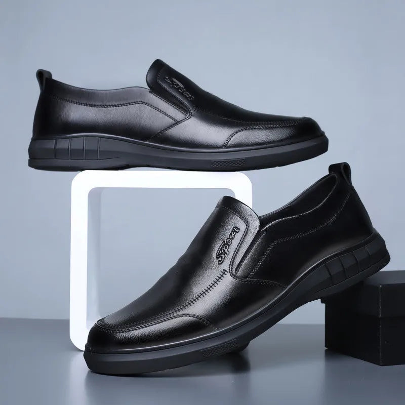 Men's black casual leather shoes with non-slip soft sole and round toe on a white background