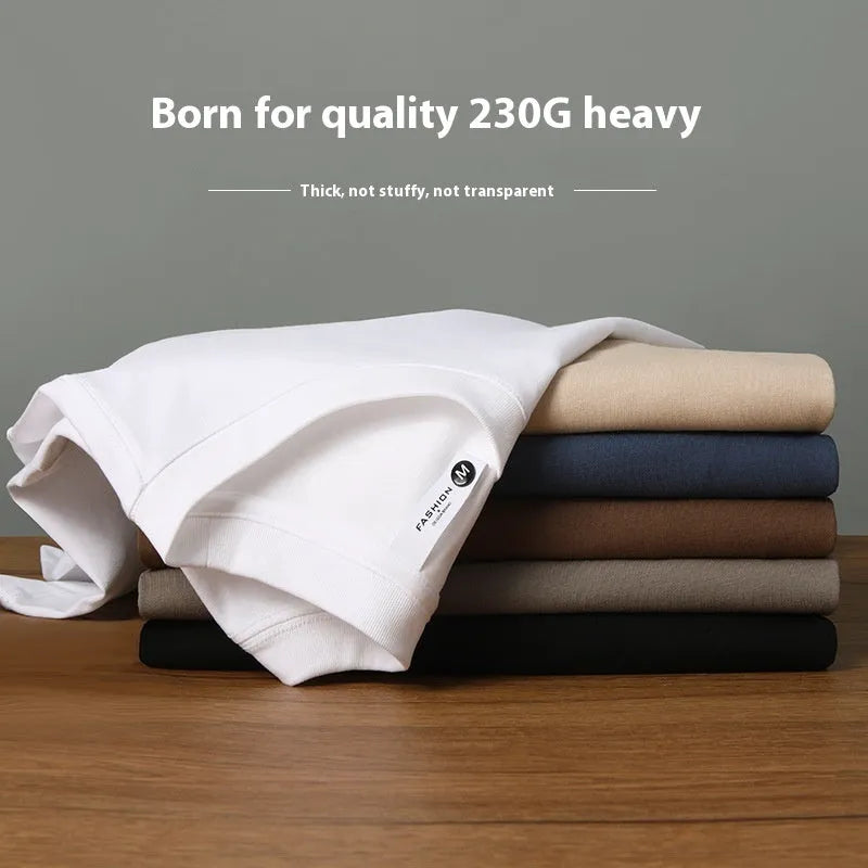 Heavyweight cotton blend T-shirt in drop shoulder design showing loose fit and round neck in multiple colour options