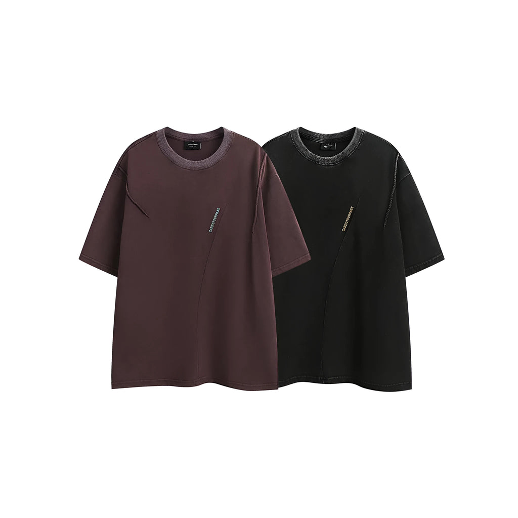 Purple and black washed cotton retro T-shirt with embroidery, shown in loose fit with half-length sleeves.