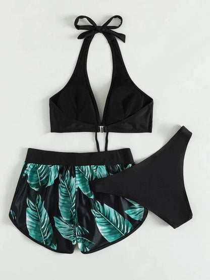 Stylish leaf print bikini with shorts in a variety of vibrant colors, perfect for summer beach or pool wear.