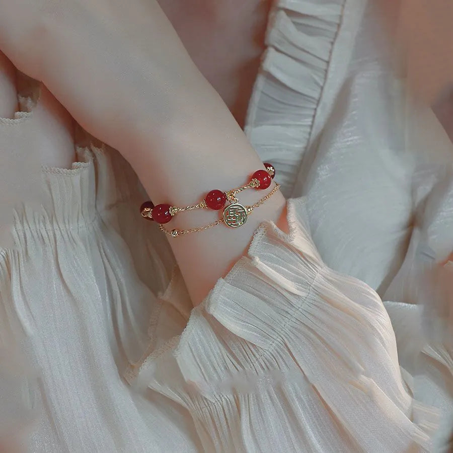 Red Agate Hongma blessing card double-layer charm bracelet for women in a gift box.