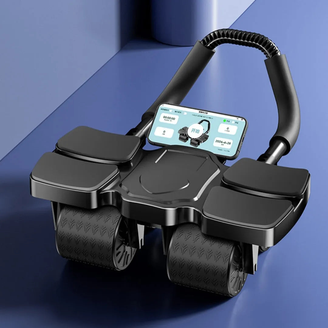 A black abdominal exercise wheel with four wheels and an automatic rebound mechanism on a floor.