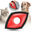 Silicone pet hair remover brush with scraper head and non-slip handle for cleaning fur from carpets and sofas