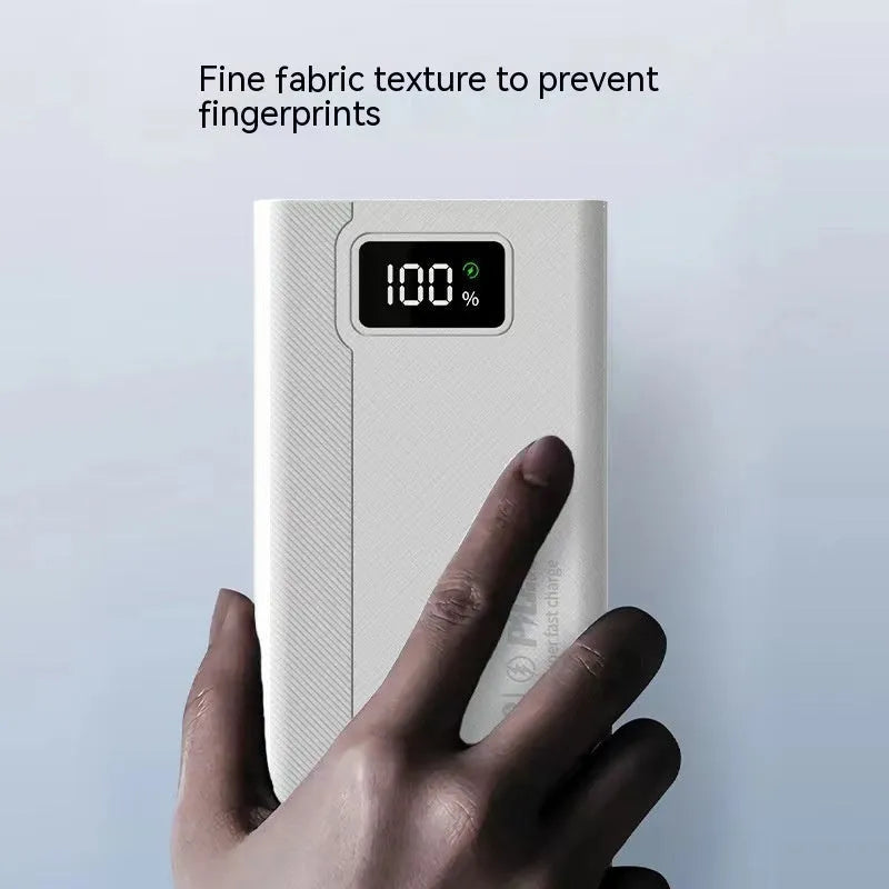 Black and white large capacity power bank with fast charging function showing dimensions