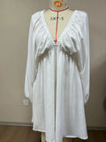 Women's V-neck dress with puff sleeves and flounced swing skirt in polyester fabric