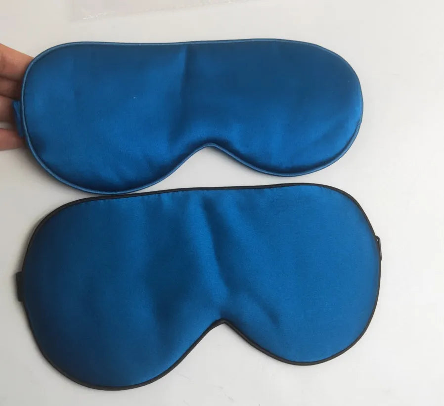 Double-sided silk eye mask in multiple colours including black, gold, green, peacock blue, pink, purple, silver