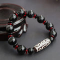 Hand-woven black agate and chalcedony dzi bead bracelet with 11mm geometry beads