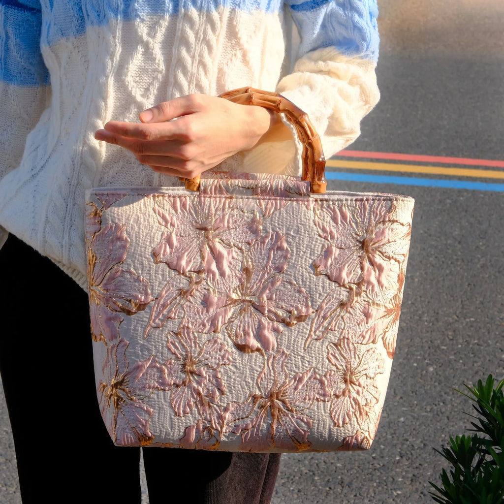Light blue square canvas shoulder bag with gold bronzing flower pattern and double straps