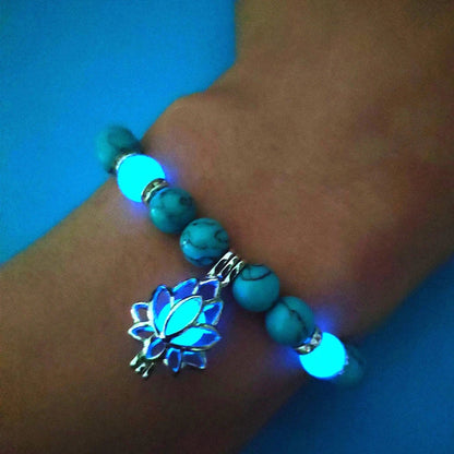 Luminous lotus charm bracelet with mesmerizing glow-in-the-dark beads, made of premium alloy and turquoise fluorescent stone