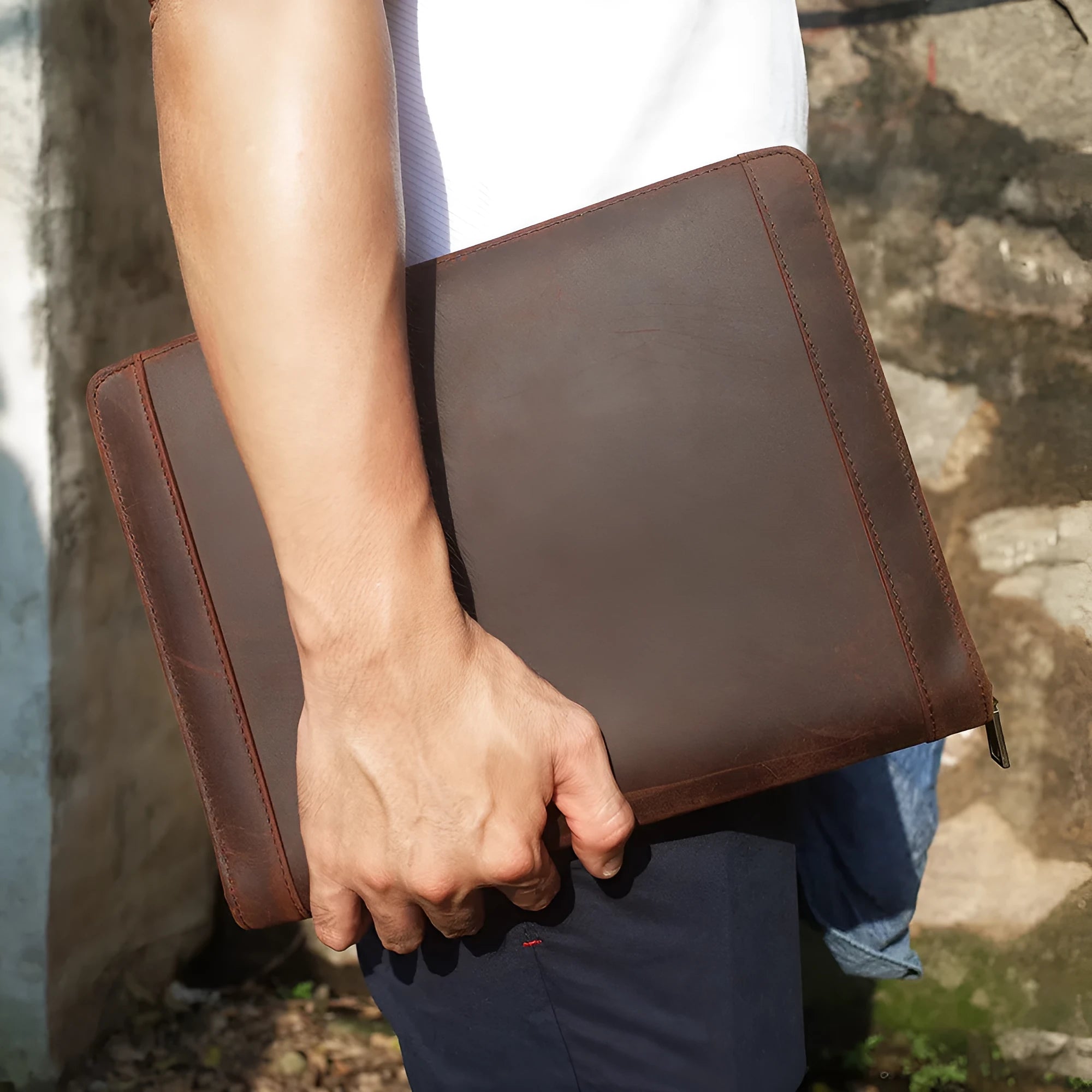 Genuine cowhide leather computer protective case with organisational compartments.